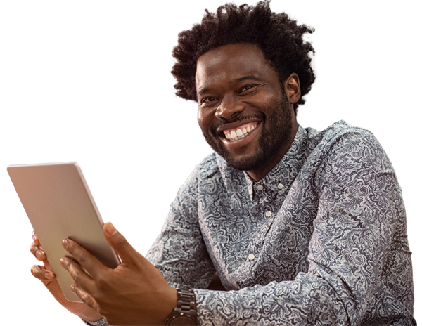 Smiling man using a tablet